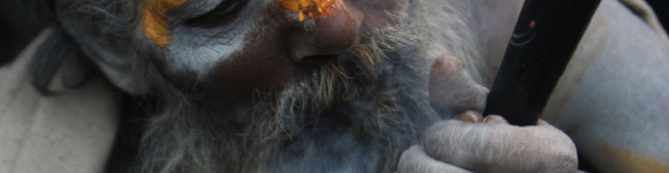 Sadhu Smoking Ganja in Varanasi - Significant Landmark in Kashi, Varanasi